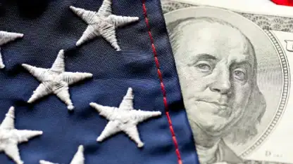 American flag draped over a one hundred dollar bill, symbolizing patriotism and wealth