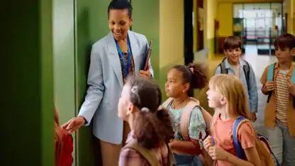 image of teacher with students