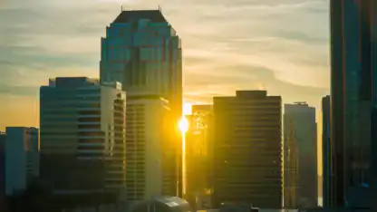 Sunset through city skyscrapers